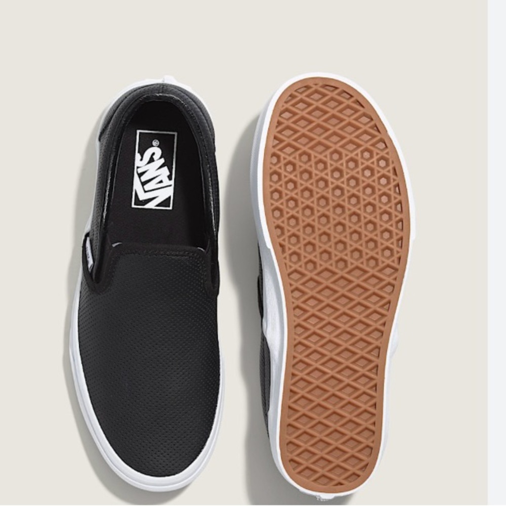 Vans Black and White Slip-On Sneakers